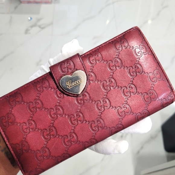 Gucci Handbags - 🔹️ Gucci🔹️ Vintage Guccissima Burgundy Wallet with Heart Snap ✨️💜
